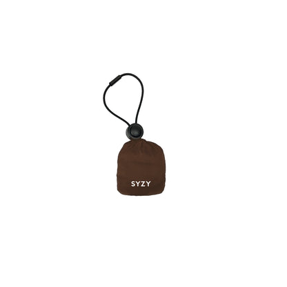 A burnt umber pouch with a drawstring closure and a black clasp. The syzy logo is visible on the front of the pouch.