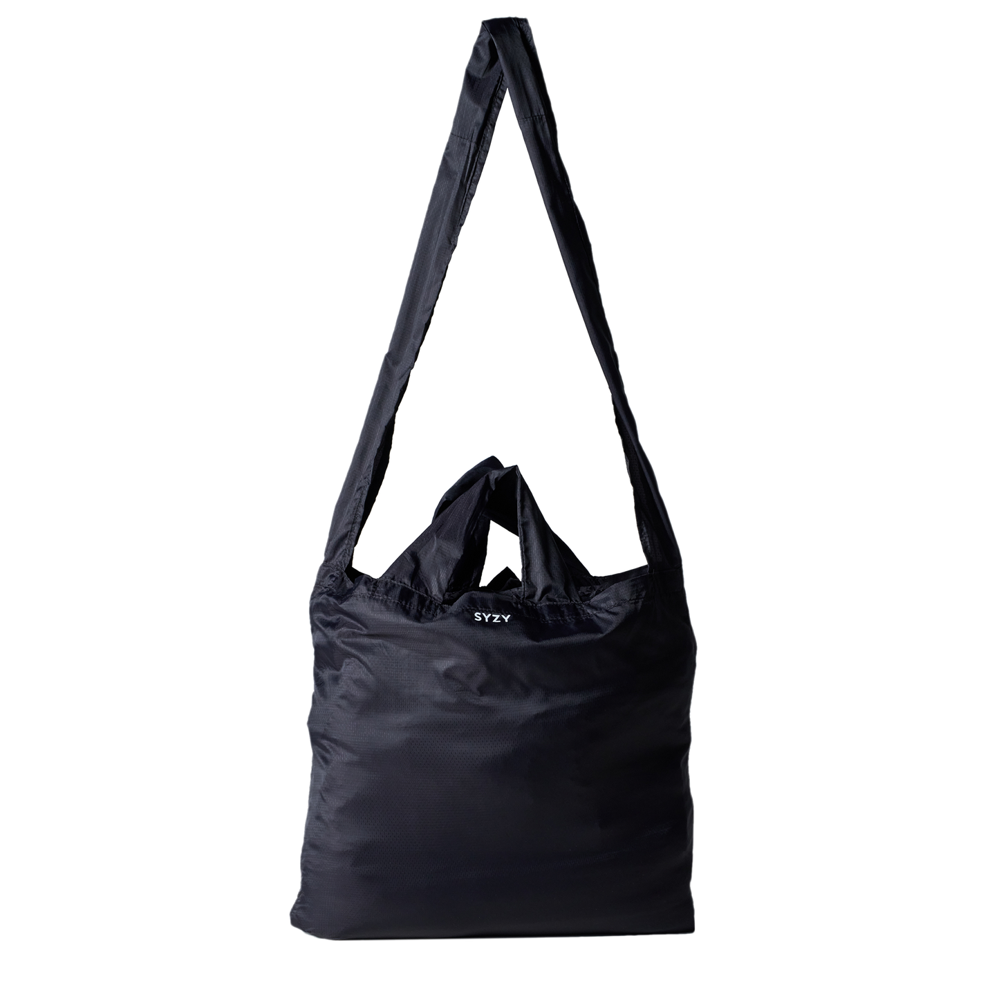 SYZY Black Tetra Tote Bag Displayed on a transparent background.