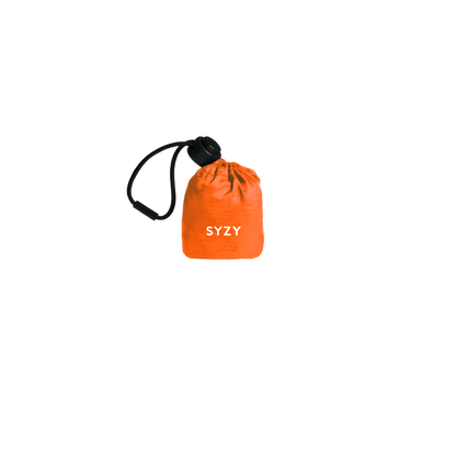 Torii Orange Tetra Tote Bag is stored inside a compact orange pouch with a drawstring against a transparent background.